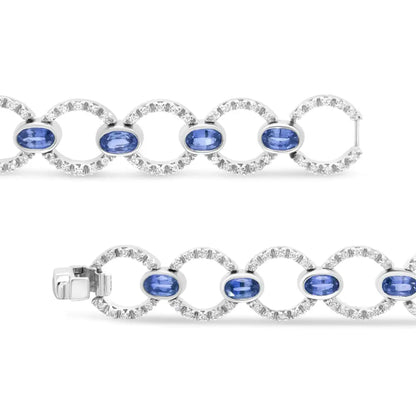 18k White Gold 6 Cttw Diamond and 5x3mm Oval Blue Sapphire Openwork Circle Link Bracelet (f-g Color Si1-si2 Clarity)