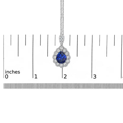 18k White Gold Recrystallized 9x7 Mm Pear Shaped Blue Sapphire and 2 4/5 Cttw Diamond Halo Bail 18’’ Inch Pendant