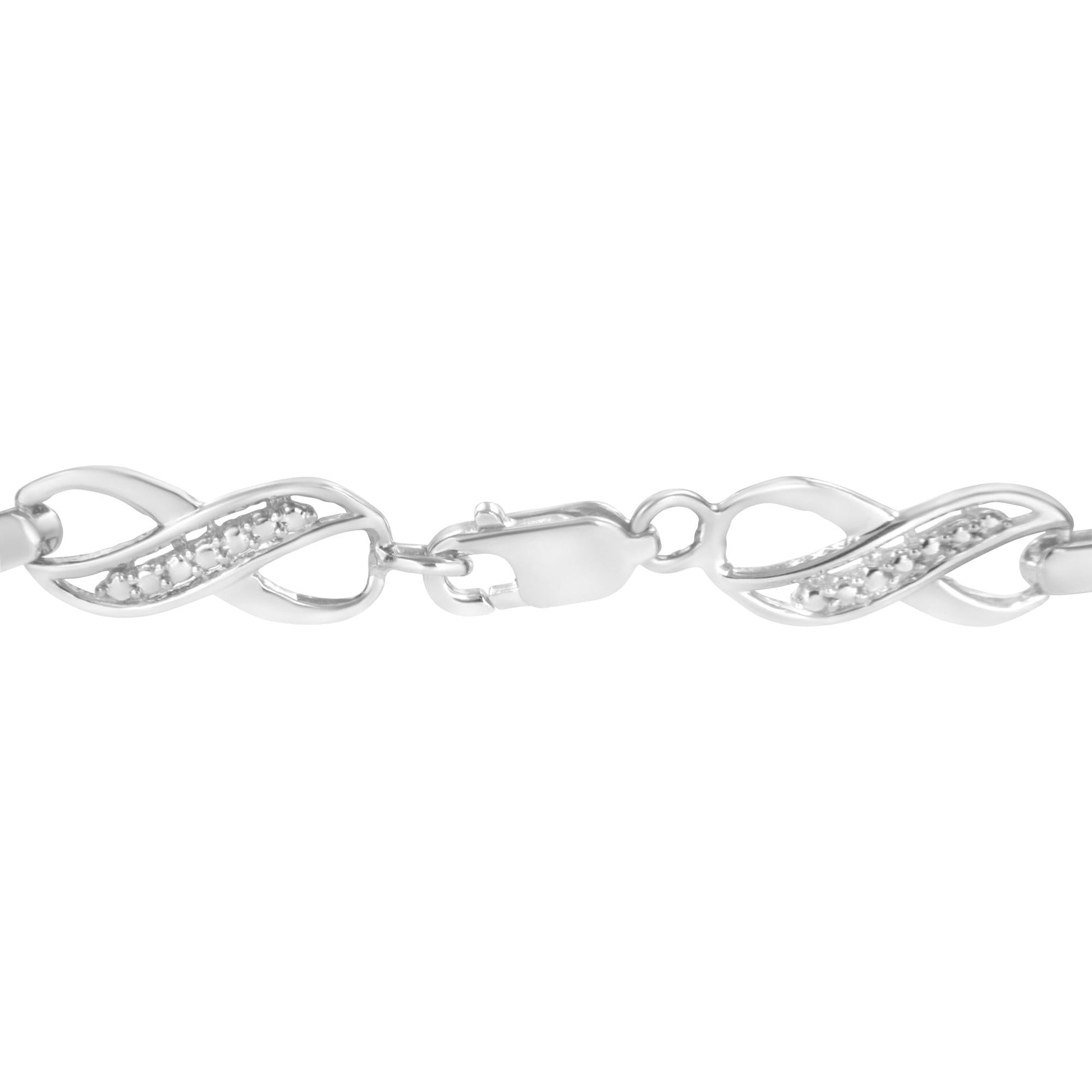 .925 Sterling Silver Prong Set Diamond Accent Ribbon and Infinity Link Bracelet