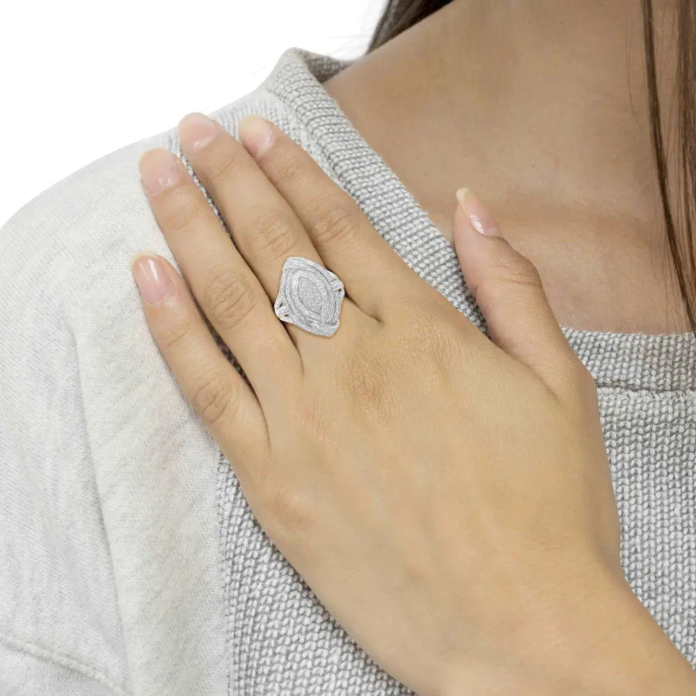 Diamond engagement ring on a woman’s hand.