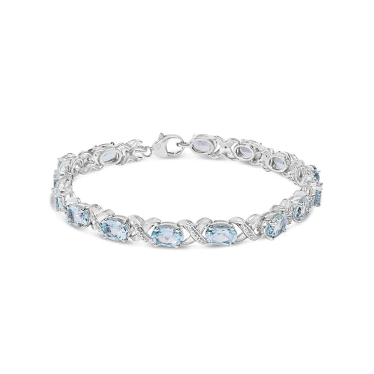 .925 Sterling Silver 16.0 Cttw Oval Blue Topaz and Diamond Accent Tennis x Link Bracelet (i-j Color I1-i2 Clarity)