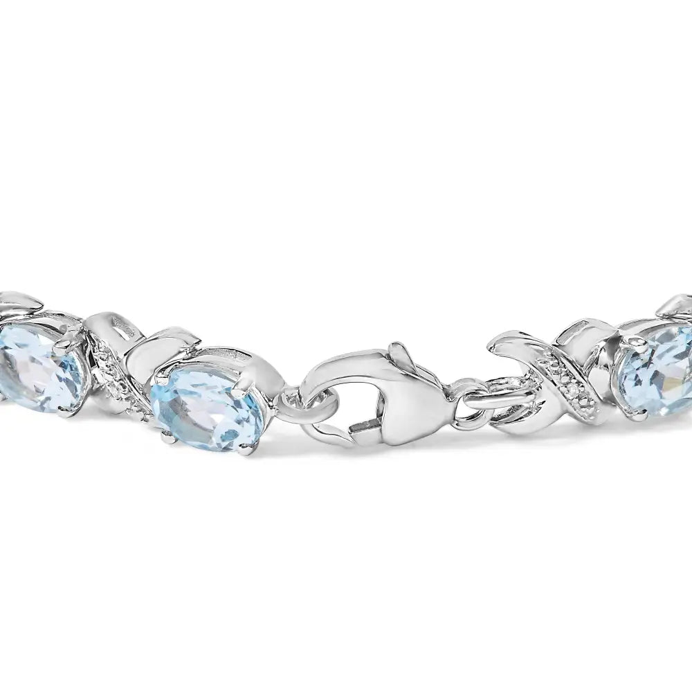 .925 Sterling Silver 16.0 Cttw Oval Blue Topaz and Diamond Accent Tennis x Link Bracelet (i-j Color I1-i2 Clarity)