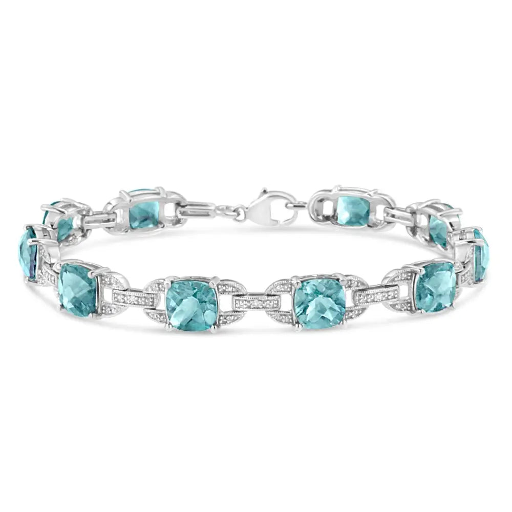 .925 Sterling Silver 7x7 Mm Cushion Cut Blue Topaz and 1/20 Cttw Round Diamond Fashion Tennis Bracelet (i-j Color I1-i2