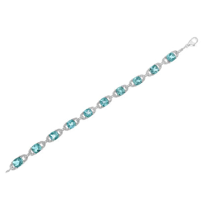 .925 Sterling Silver 7x7 Mm Cushion Cut Blue Topaz and 1/20 Cttw Round Diamond Fashion Tennis Bracelet (i-j Color I1-i2