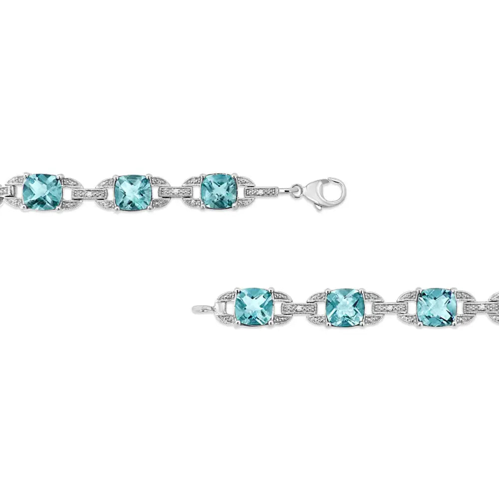 .925 Sterling Silver 7x7 Mm Cushion Cut Blue Topaz and 1/20 Cttw Round Diamond Fashion Tennis Bracelet (i-j Color I1-i2