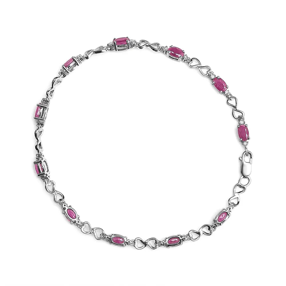 .925 Sterling Silver Pink Oval Shaped Ruby and 1/4 Cttw Diamond 7.25’’ Link Bracelet (i-j Color I2-i3 Clarity)