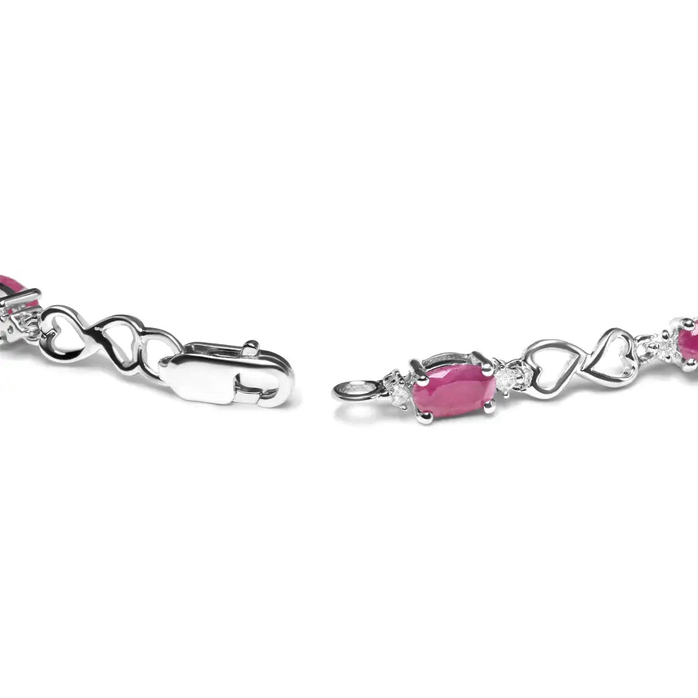 .925 Sterling Silver Pink Oval Shaped Ruby and 1/4 Cttw Diamond 7.25’’ Link Bracelet (i-j Color I2-i3 Clarity)