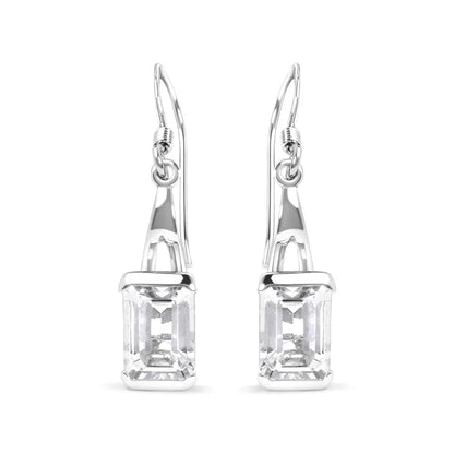 Elegant Emerald Cut White Topaz Solitaire Dangle Earrings in Sterling Silver