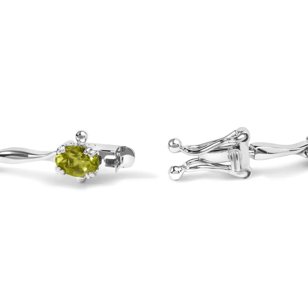 Enchanting Oval Shaped Created Green Peridot Link Bracelet in Sterling Silver