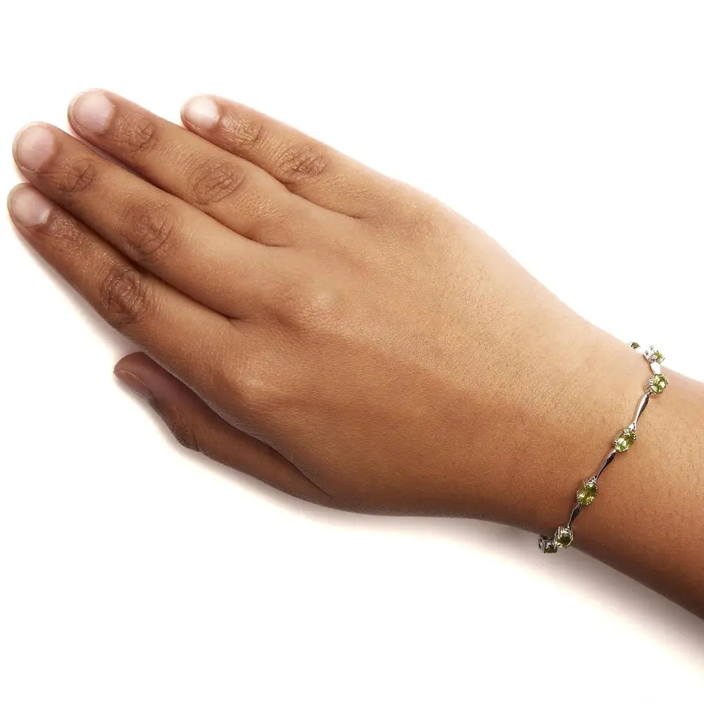 Enchanting Oval Shaped Created Green Peridot Link Bracelet in Sterling Silver