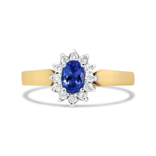 Exquisite 14k Yellow Gold Oval Blue Tanzanite and Cttw Round Diamond Ring