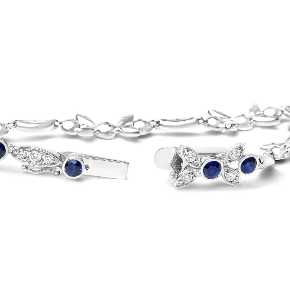 Exquisite 18k White Gold Floral Bracelet with Round Blue Sapphire and Diamonds