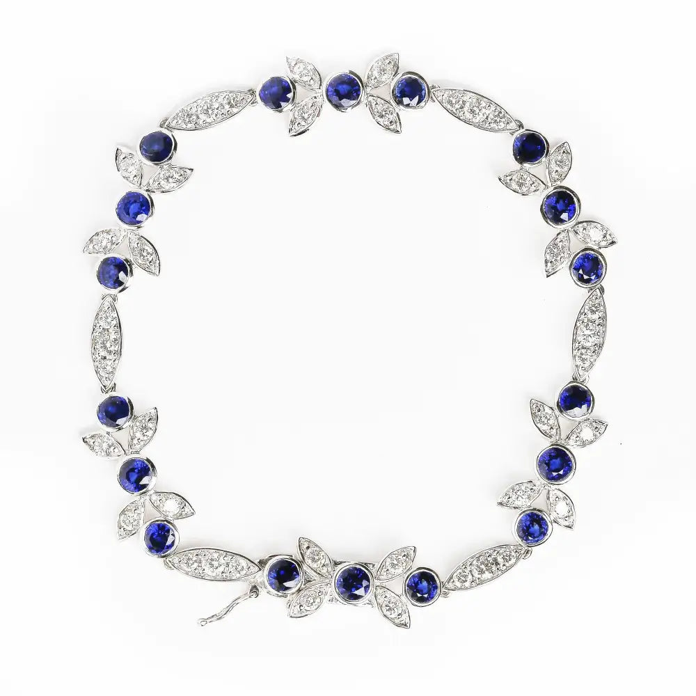 Exquisite 18k White Gold Floral Bracelet with Round Blue Sapphire and Diamonds