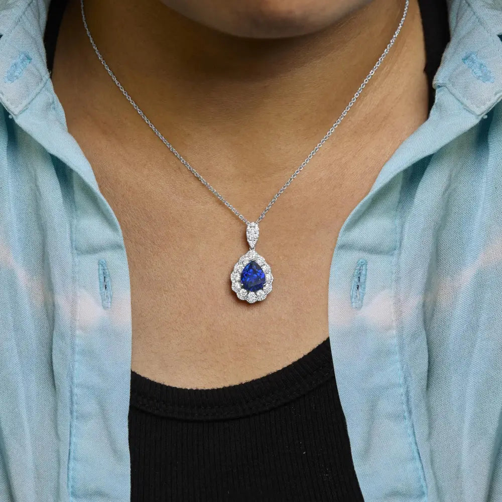 Exquisite 18k White Gold Pendant Necklace with Pear Shaped Blue Sapphire