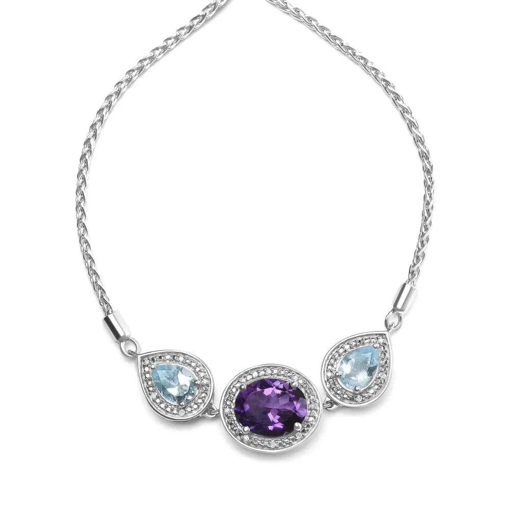 Exquisite Sterling Silver Oval Bolo Bracelet with Blue Topaz and Amethyst