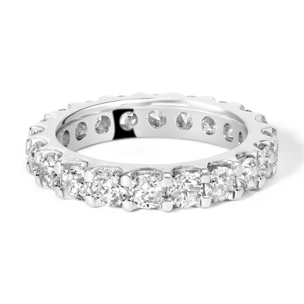 Exquisite White Gold Shared Prong Eternity Band with Diamond Brilliance