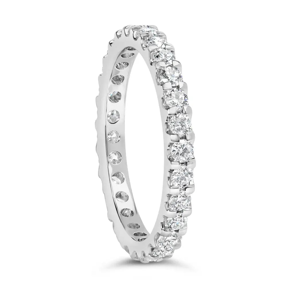 Exquisite White Gold Shared Prong Eternity Band with Diamond Brilliance