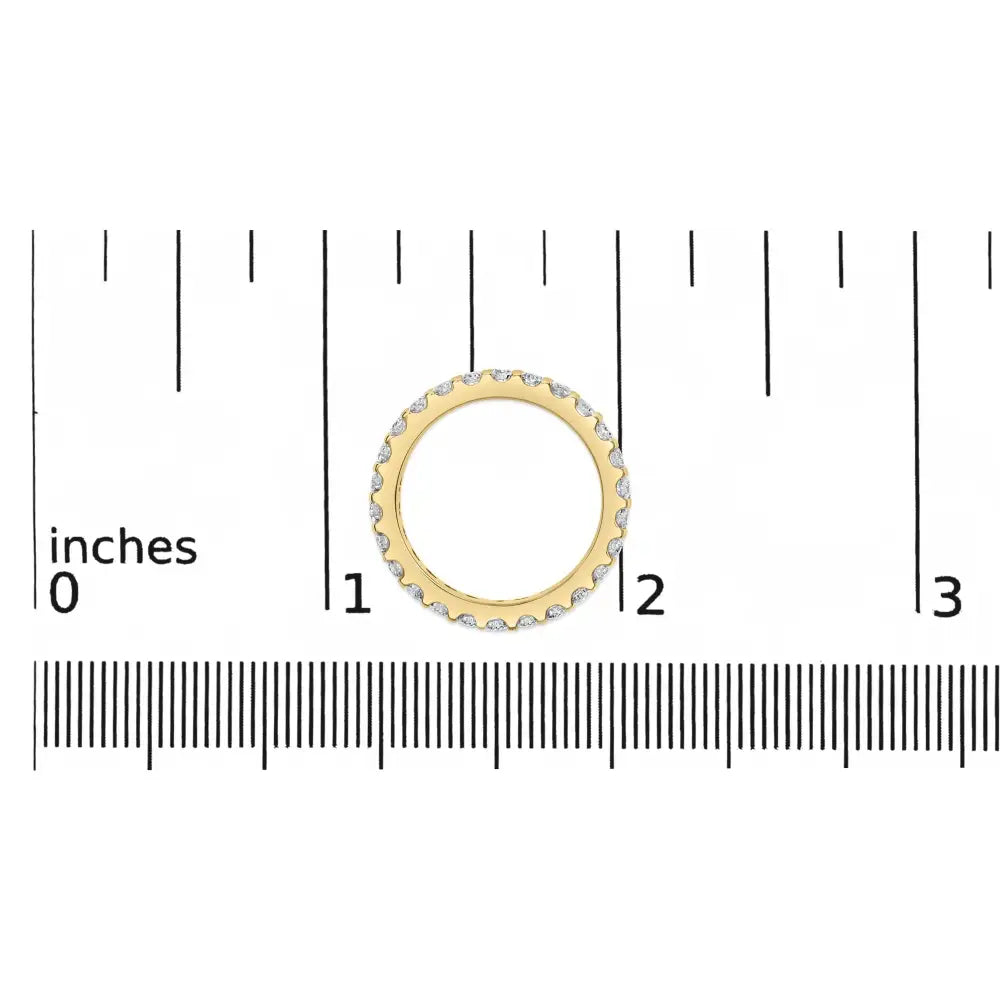 Exquisite Yellow Gold Shared Prong Eternity Band with Round Diamonds