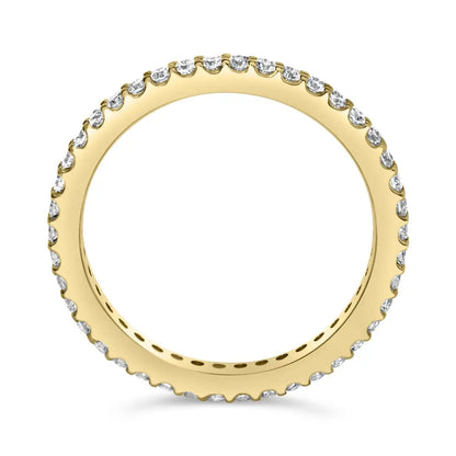 Exquisite Yellow Gold Shared Prong Eternity Band with Round Diamonds