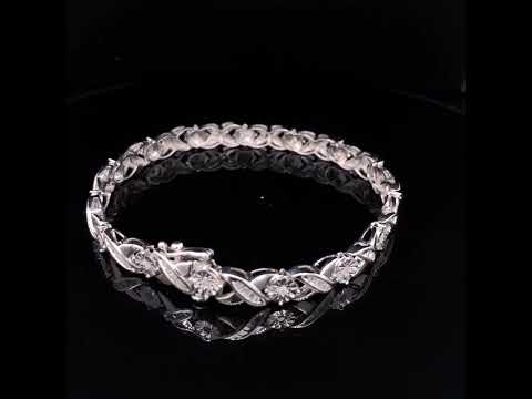 .925 Sterling Silver 1.0 Cttw Round &amp; Baguette Diamond X-Link Tennis Bracelet.